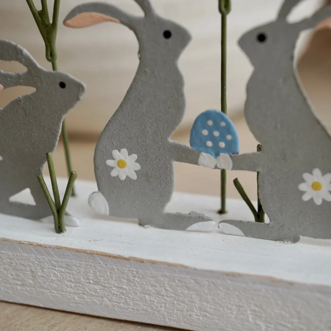 Bunnies Hiding Easter Eggs