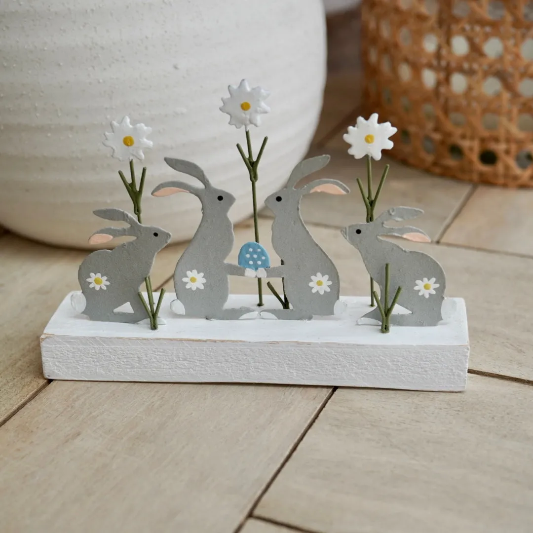 Bunnies Hiding Easter Eggs